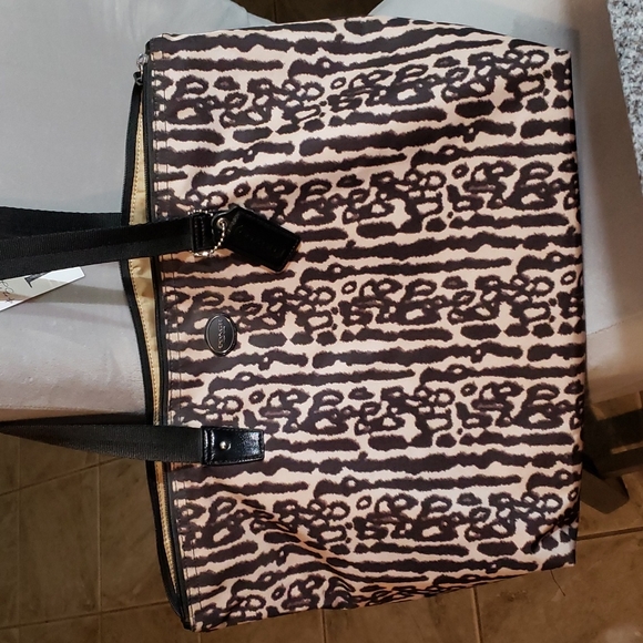 Coach Handbags - Coach Ocelot Print Nylon travel Bag, Snap Pouch & Cosmetic Pouch-Set